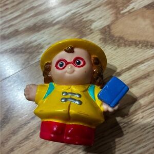 Yellow Raincoat Kids Figure Toy with Red Glasses and Blue Book Accessory